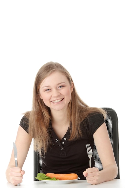 Uśmiechnięta osoba jedząca